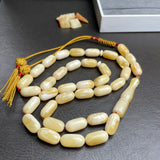 مسبحة من الكهرمان الأبيض الملكي، 33 خرزة 8×15 مم، 27.17 جرام، مع شهادة مختبر