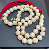 مسبحة من الكهرمان الأبيض مصنوعة يدوياً | 11.6 مم | 43 غ | 45 حبة