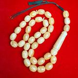 WHITE EGG SHAPE NATURAL AMBER MISBAHA 16.5mm x 21.8mm 145g