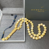 مسبحة إسلامية مصنوعة يدوياً من العنبر الأبيض، مقاس 11.5 مم، وزن 45.6 غرام