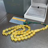 مسبحة إسلامية مصنوعة يدوياً من العنبر الأصفر، مقاس 10×14 مم، وزن 46.7 غرام