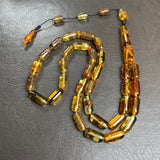 مسبحة إسلامية بلون العنبر العسلي، 6.5 × 14 مم، 16.1 غرام