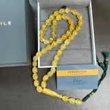 مسبحة إسلامية مصنوعة يدوياً من العنبر الأصفر، مقاس 10×14 مم، وزن 46.7 غرام