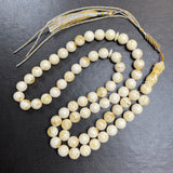 مسبحة مصنوعة يدوياً من الكهرمان الأبيض | 10.8 مم | 47 غ | 66 حبة