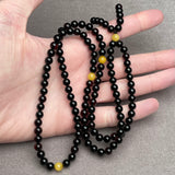 BLACK AMBER MISBAHA 6,3mm 15,9g