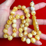 مسبحة إسلامية مكونة من 33 حبة، مصنوعة من كهرمان البلطيق الطبيعي، قطرها 12.9 مم ووزنها 37.6 غرام.