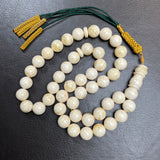 مسبحة من الكهرمان الأبيض مصنوعة يدويًا | 11.8 مم | 42.5 غرام | 45 حبة