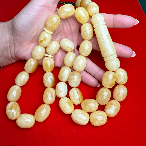 *WHITE EGG SHAPE AMBER MISBAHA 16.5mm x 21.8mm 145g