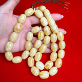 *WHITE EGG SHAPE AMBER MISBAHA 14.5mm x 20mm 107g