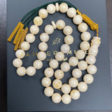 مسبحة من الكهرمان الأبيض مصنوعة يدويًا | 11.8 مم | 42.5 غرام | 45 حبة