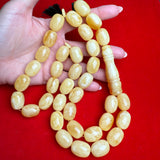 *WHITE EGG SHAPE AMBER MISBAHA 15mm x 20mm 114.2g