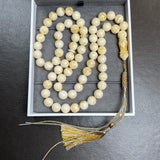 مسبحة مصنوعة يدوياً من الكهرمان الأبيض | 10.8 مم | 47 غ | 66 حبة