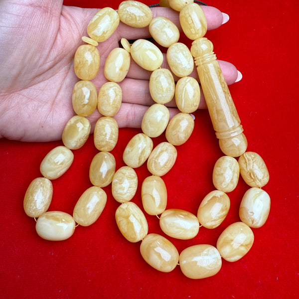 *WHITE EGG SHAPE AMBER MISBAHA 15mm x 21mm 122g