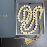 مسبحة مصنوعة يدوياً من الكهرمان الأبيض | 10.8 مم | 47 غ | 66 حبة