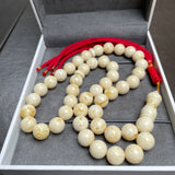 مسبحة من الكهرمان الأبيض مصنوعة يدوياً | 11.6 مم | 43 غ | 45 حبة