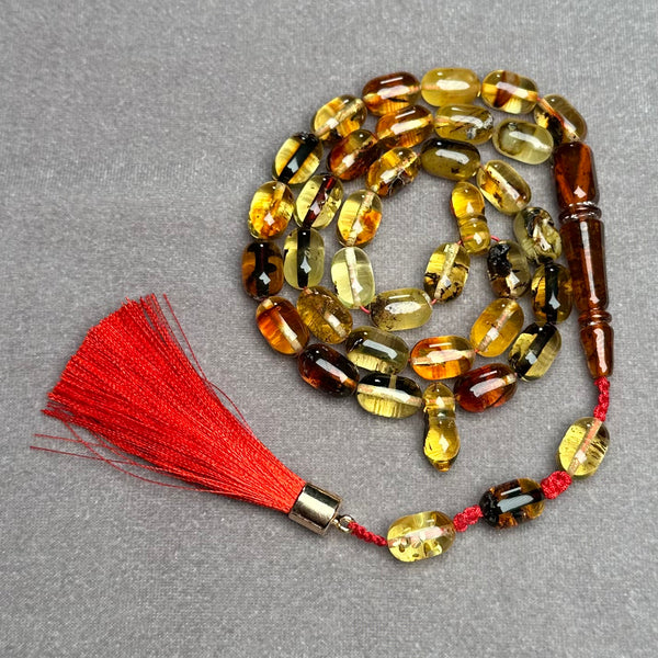 TRANSPARENT AMBER MISBAHA 7,6x11,7mm 20,1g