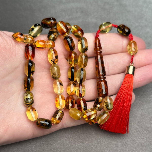 TRANSPARENT AMBER MISBAHA 7,6x11,7mm 20,1g
