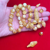 *YELLOW/WHITE AMBER MISBAHA 12,1mm 41,5g