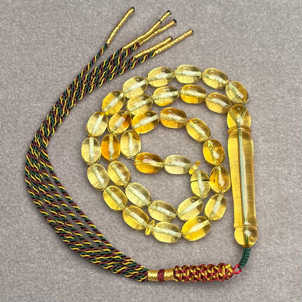 TRANSPARENT AMBER MISBAHA 7,3x10,3mm 15,3g