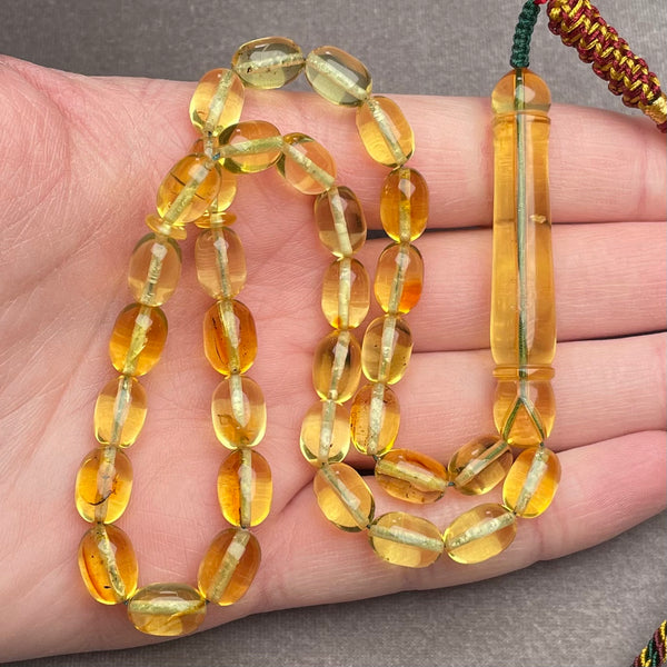 TRANSPARENT AMBER MISBAHA 7,3x10,3mm 15,3g