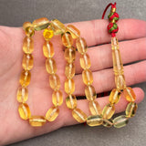 TRANSPARENT AMBER MISBAHA 7,6x11,7mm 17,9g