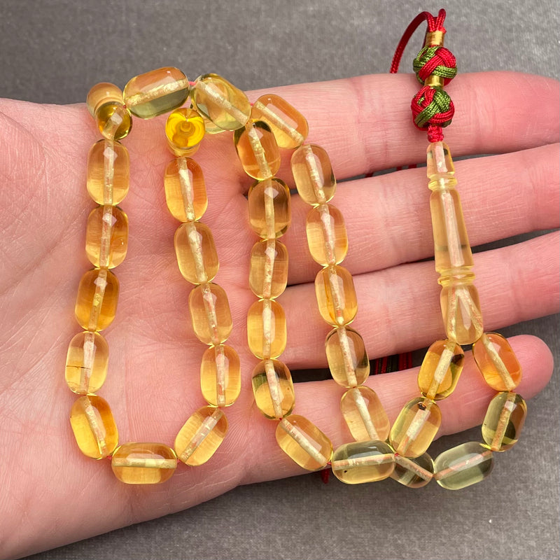 TRANSPARENT AMBER MISBAHA 7,6x11,7mm 17,9g