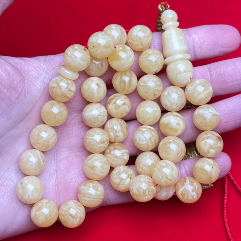 YELLOW/WHITE AMBER MISBAHA 12,2mm 44,7g