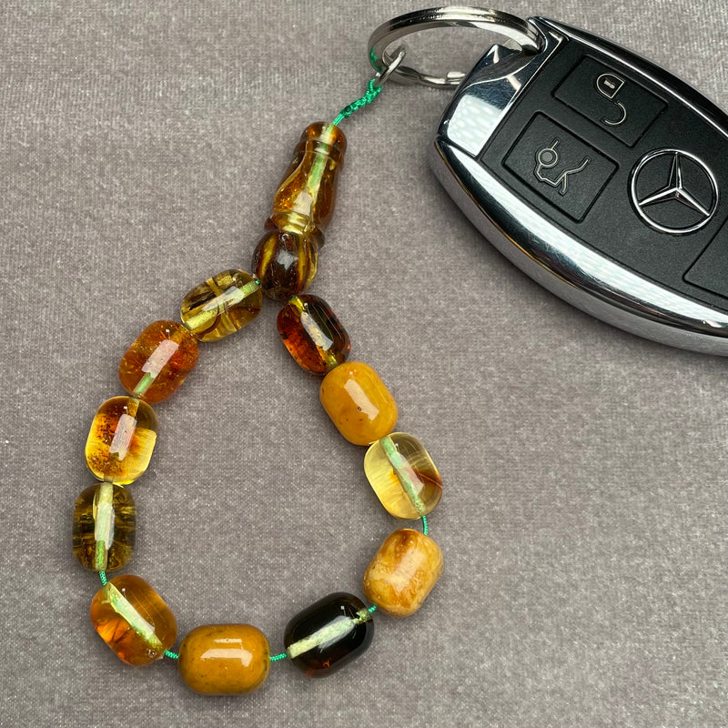 TRANSPARENT AMBER KEYCHAIN 9x12,1mm 11,2g