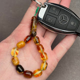 TRANSPARENT AMBER KEYCHAIN 9x12,1mm 11,2g