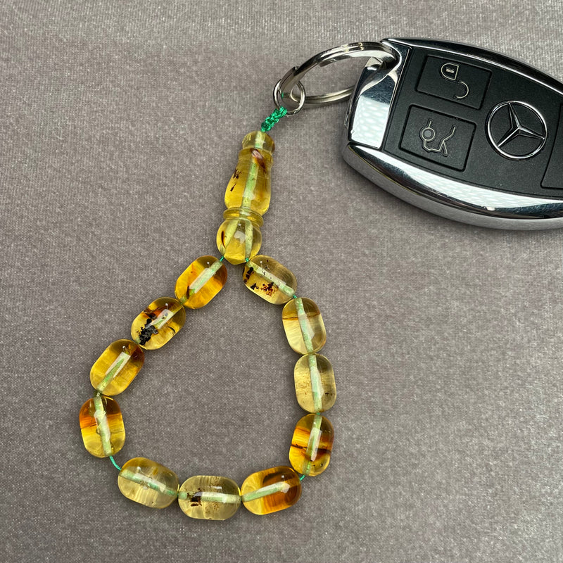 TRANSPARENT AMBER KEYCHAIN 8,1x11,9mm 9,9g