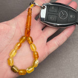 TRANSPARENT AMBER KEYCHAIN 8,1x11,9mm 9,8g