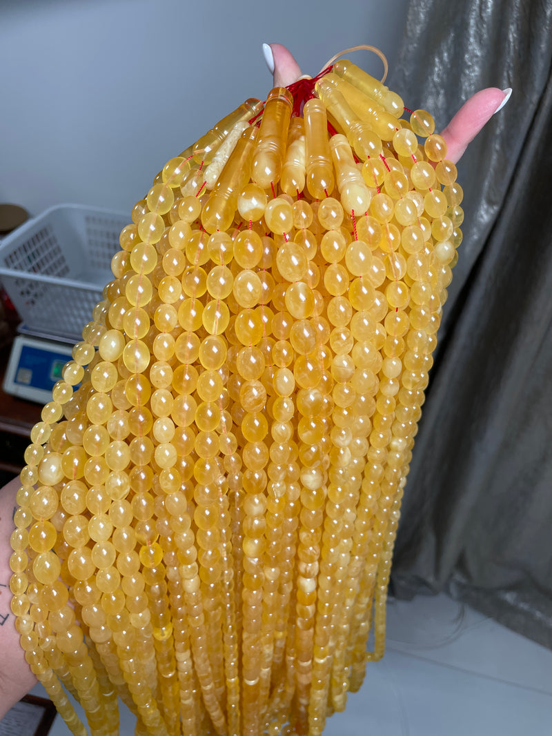 YELLOW TRANSPARENT AMBER MISBAHA 10-12mm