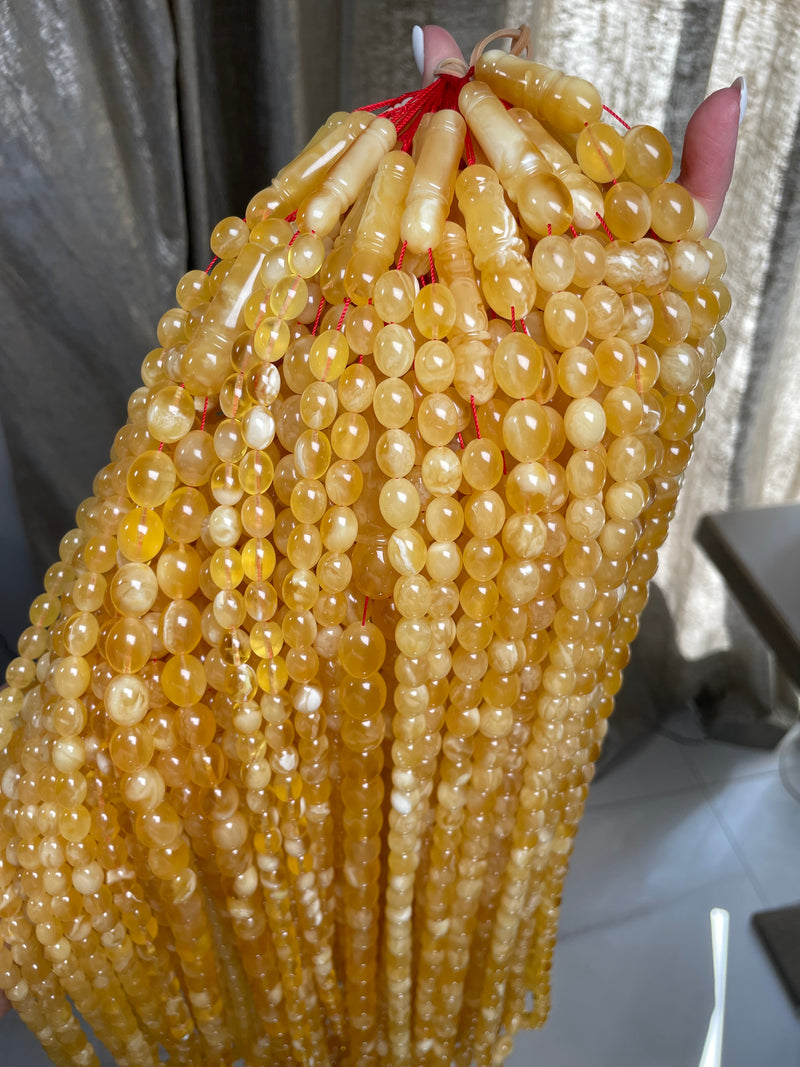 YELLOW TRANSPARENT AMBER MISBAHA 10-12mm