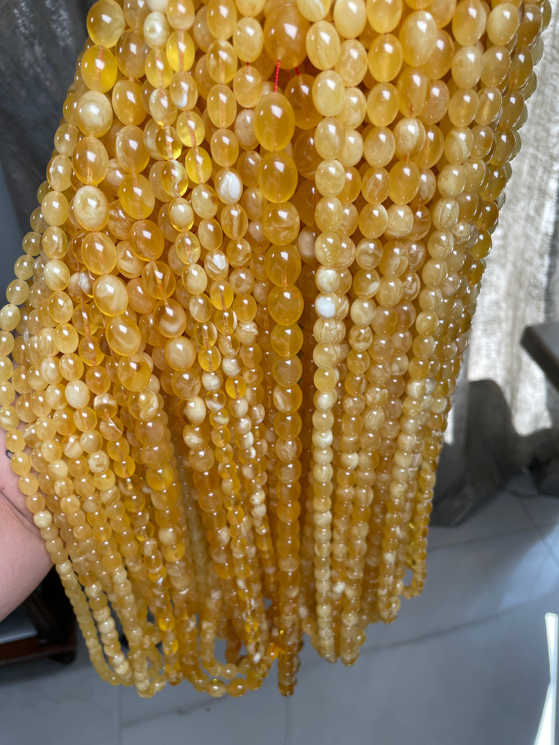 YELLOW TRANSPARENT AMBER MISBAHA 10-12mm